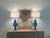 Wow! Absolutely stunning pair of Marbro blue Murano art glass double socket table lamps with brass trim. As you can see in...