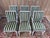 A set of six louis xvi style chairs in carved wood, painted a slightly grayish white, displaying a soft and harmonious...