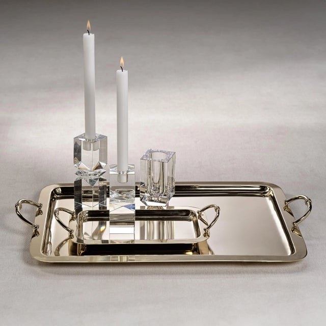 This steel serving tray is perfect for all your entertaining needs. It has a polished finish and can be used for serving...