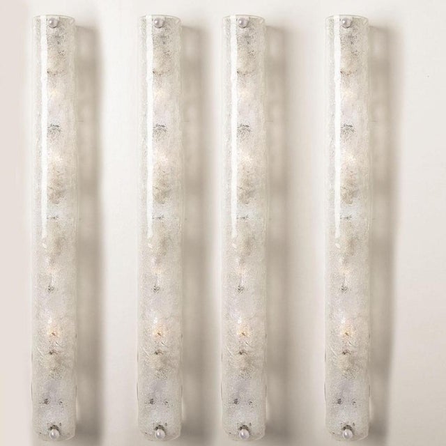 Clean lines to complement all decors. Wonderful high-end wall light fixtures with white detail and thick bubbled blown ice...