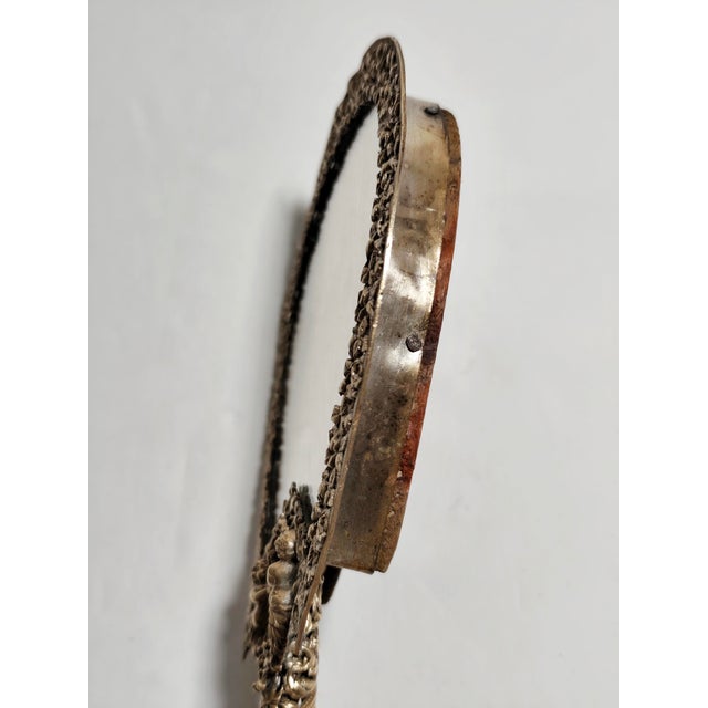 Embossed Brass Hand Mirror, Spain, 1940s, in Very Good conditions. Designed 1920 to 1949