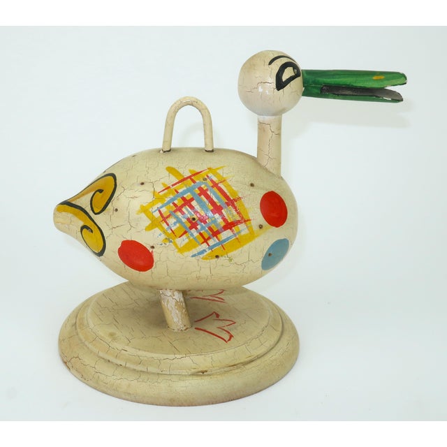 C.1930 painted wood duck toothpick and napkin server by Robinhood Ware of California. This charming quacker was designed...