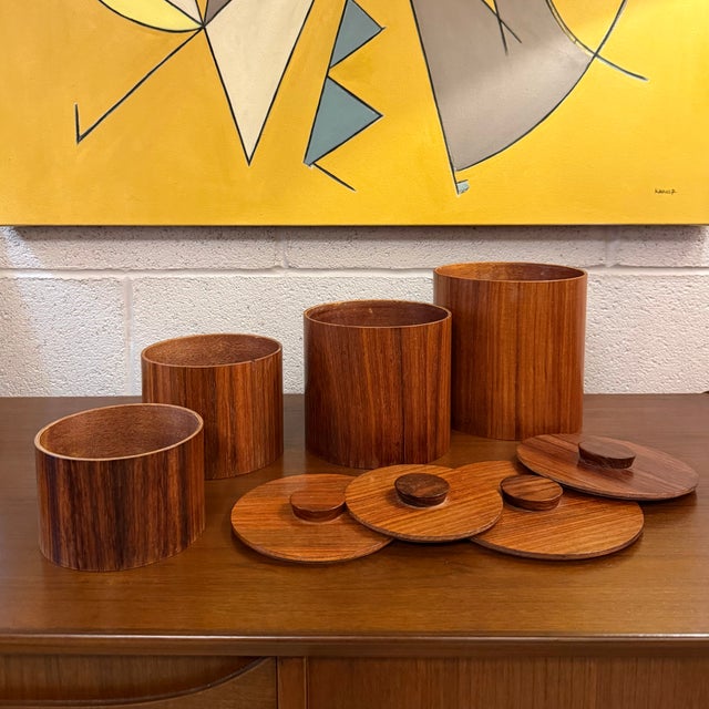 This is a set of 4 Mid-Century Modern teak Japanese nesting canisters by the Otagiri Mercantile Company. The set features...