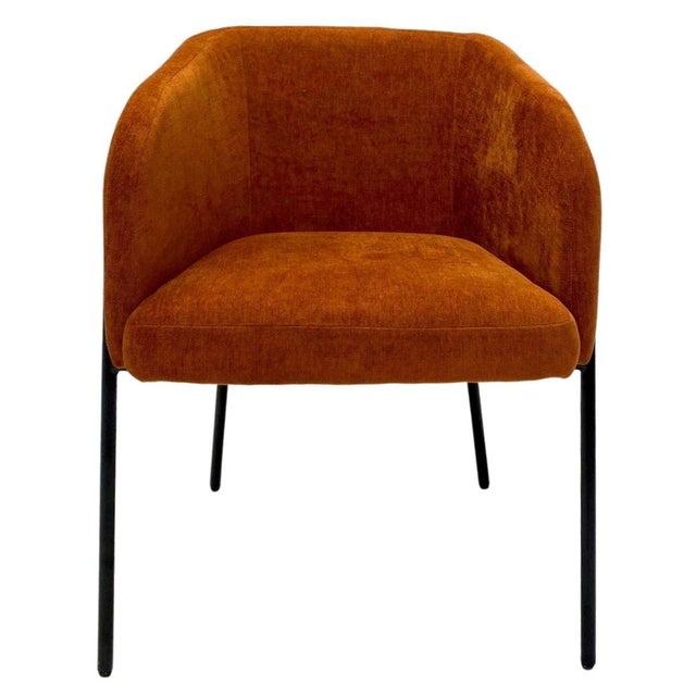 Classic matte black legs create a base and supporting backrest for the Estella dining chair. Its understated silhouette is...