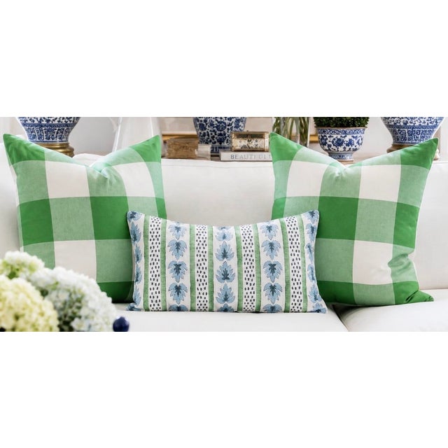 One Set of three cotton buffalo check pillows in Kelly Green and White and one James stripe cotton lumbar down and feather...