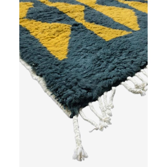 Teal & Mustard Moroccan Rug – Handmade Geometric Berber Carpet This striking handmade Moroccan rug features a deep teal...