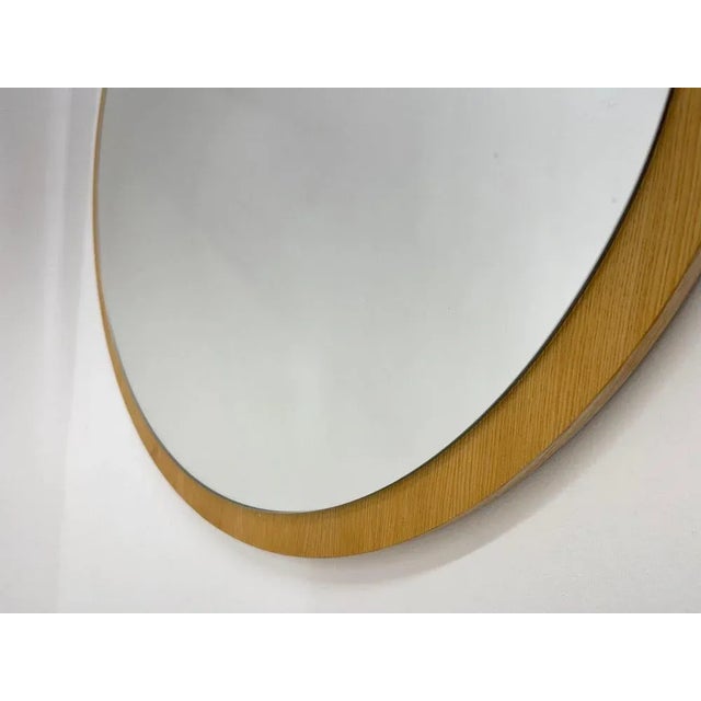 Vintage round wall mirror on wooden base from Czechoslovakia, made in the 1970s.