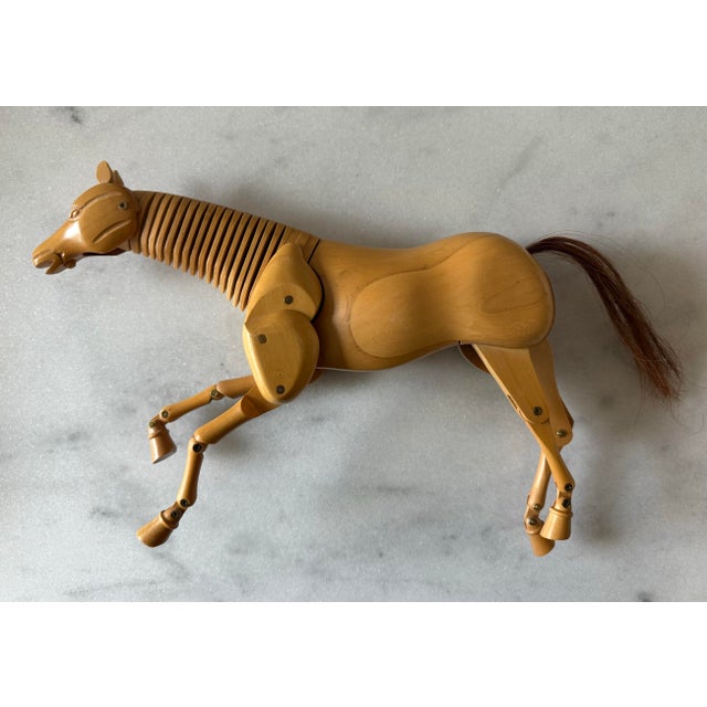 Vintage articulated wooden horse artist's figure. Featuring movement in legs, head and neck and a horse hair tail....