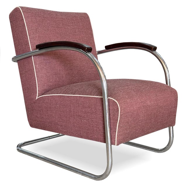 A functionalist armchair manufactured by kovona n.p. Based on the famos type by mücke–melder, produced under licence and...