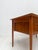 Elegant Danish desk crafted in teak during the 1960s. The design combines clean lines, refined proportions and practical...
