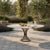 Metal Modern Kreiss Trieste Collection 60" Round Travertine & Wrought Iron Center or Dining Table For Sale - Image 7 of 14