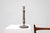 An elegant French Empire‑style candlestick dating to around 1900, crafted in silver‑plated copper and richly decorated...