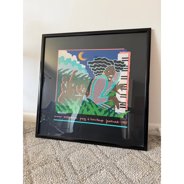 Vintage framed poster “New Orleans Jazz Heritage Festival 1987” by Hugh Ricks. Poster is silk printed in very colorful...