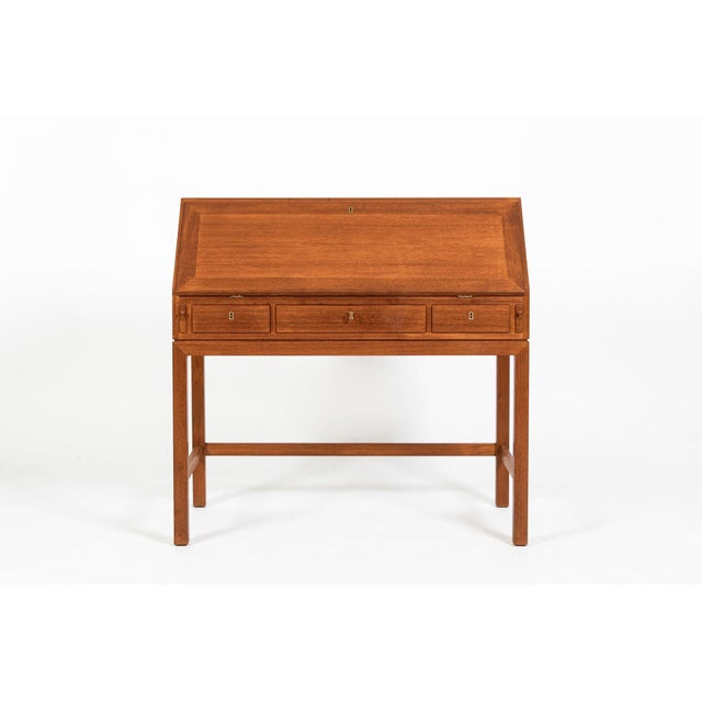 This exceptional vintage mid-century Danish modern secretary desk was produced in Denmark during the 1960s. Impeccably...