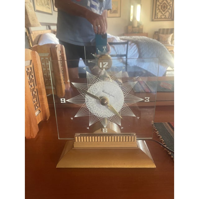 Here is a beautiful industrial piece that is so Radio City Music Hall. A light at the back illuminates the face which has...