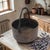A late 19th century primitive copper cauldron vessel of American or European origin, constructed from heavy-gauge hammered...