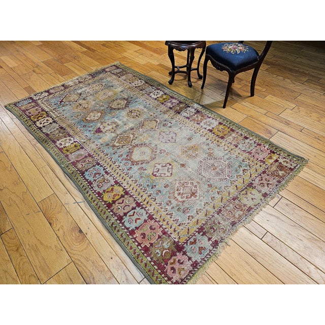 Beautiful and colorful late 19th Century Caucasian Karabagh area rug. Karabagh rugs, from the Caucasus region, are...