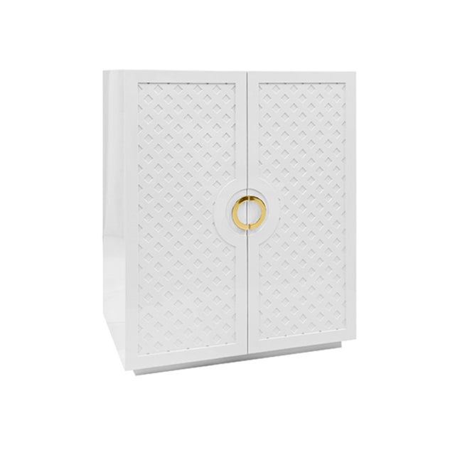 New special order item. Not vintage. Elevate your space with the Poppy White Lacquer Cabinet, a sophisticated storage...