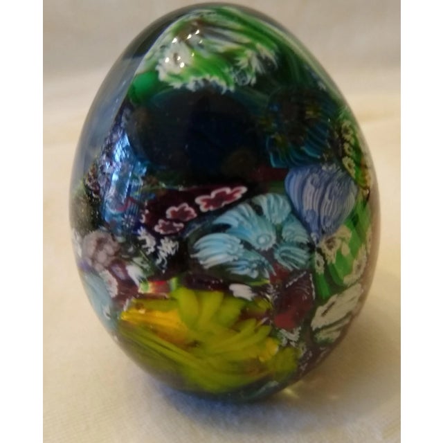 Acquired in the 1960's. Made of blown glass. An unusual egg shape.