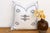 Two stacked star motifs run vertically down the center of this handcrafted Moroccan cactus silk pillow, hand-stitched in...