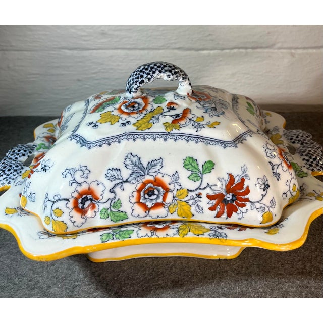 Beautifully crafted porcelain vegetable tureen by Ashworth Bros (England). Features an Oriental style floral and garden...