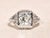 The Rebecca Ladies 18 Karat White Gold Filigree engagement ring set with 1.30 Carat European cut diamond. The diamond has...