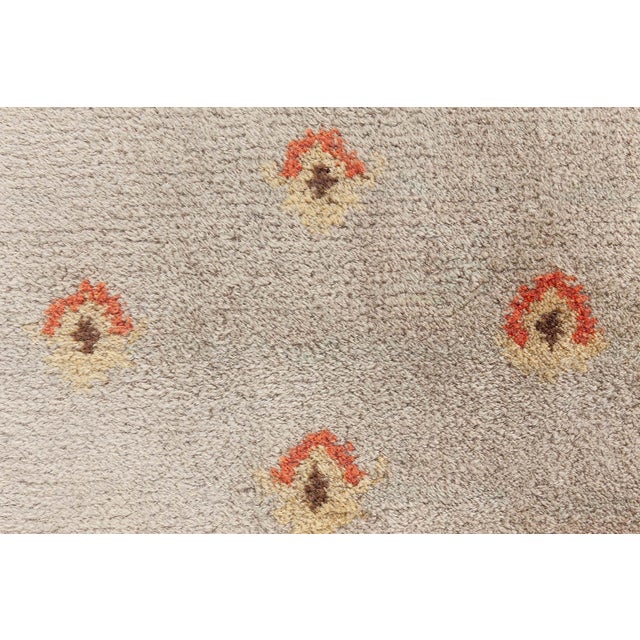Vintage Finnish Hand-Knotted Wool Pile Rug Size: 7'4" × 10'8" (223 × 325 cm) Circa: 1940 This charming vintage Finnish rug...
