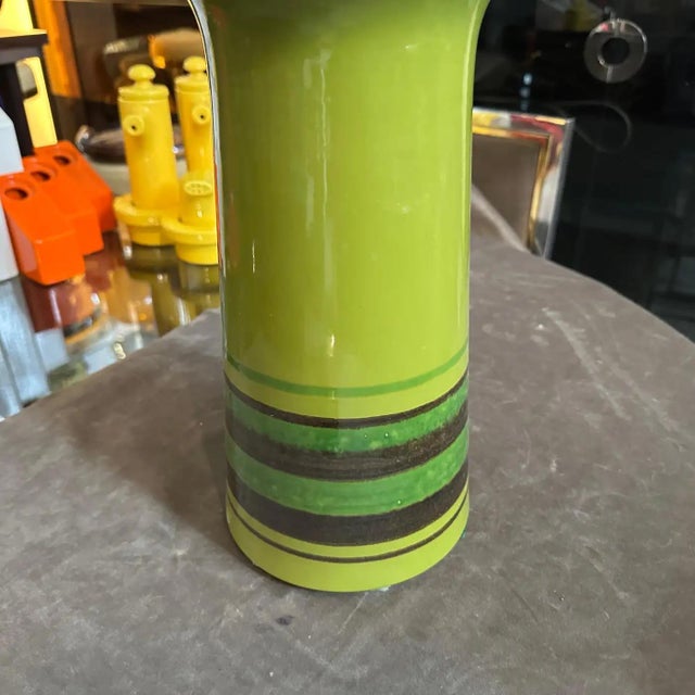 This striking vintage Italian ceramic vase by Avobin is a quintessential example of 1970s modernist design. Hand-painted...