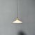 Antique white opaline glass bowl pendant lamp with a brass fixture. This one dates from the 1930s. The lamp has an...