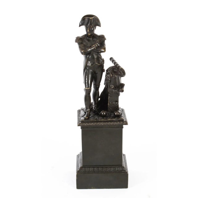 This is a finely cast brown patinated bronze Grand Tour sculpture of Napoleon Bonaparte, Mid 19th Century in date. It...