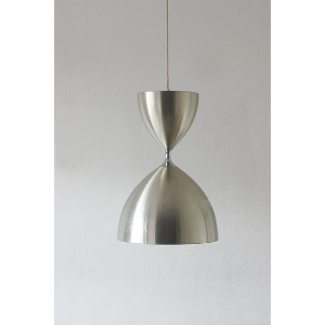 The Vega lamp by Jo Hammerborg for Fog & Mørup is a classic example of 1960s Danish modernism, combining elegance of form...