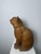 19th-century terracotta sculpture of a seated cat. Montelupo Fiorentino (Tuscany). This artistic sculpture features an...