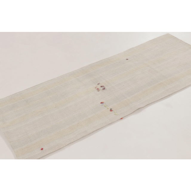 Handwoven in hemp, this 2x6 contemporary kilim runner is a serene addition to Rug & Kilim’s collection. Its softly...