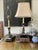 Lovely pair of lamps by Bradburn Gallery, presented in a deep, dark ebony, black ceramic candlestick shape with a pattern...