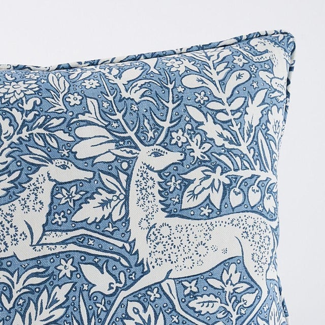 This pillow features Khan's Park Fabric with a self-welt finish. A veritable bestiary of stylized animals, this linen and...