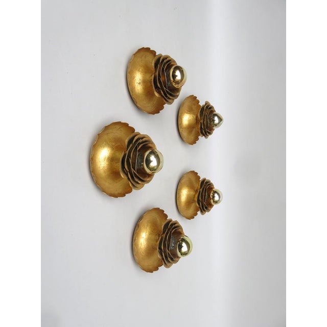 A rare set of 5 pieces of wall lights "water lilies" by Banci Firenze from the 1970s. The use of head -mirrors results in...