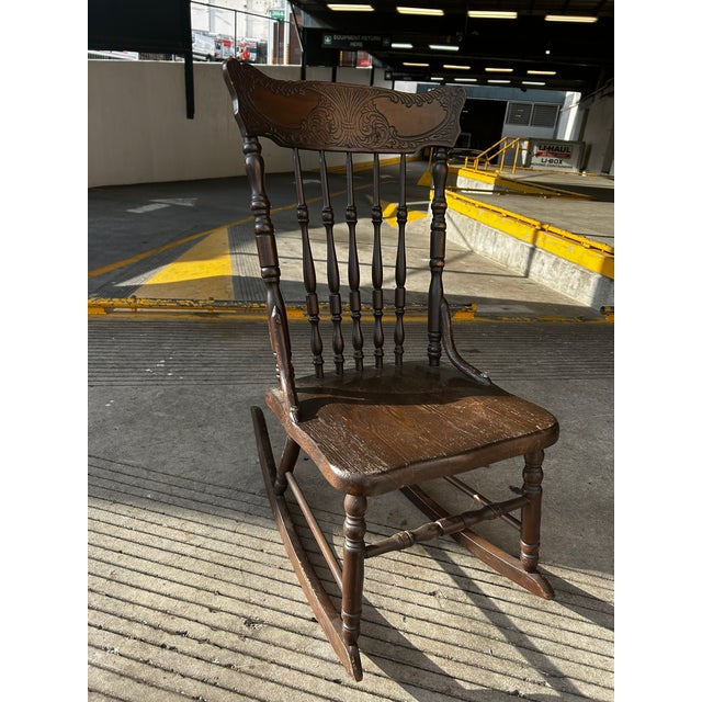 Late 20th Century Large Oak Rocking Chair. Petit. Could be used for a teenager/youth, perfect for a small adult....