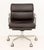 Charles and Ray Eames Soft Pad Management Chair, with dark brown leather upholstery and aluminum frame on star base. 31" H...