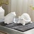 Bring a touch of whimsy and nature-inspired elegance to your space with this set of two Etched Frog and Turtle Figurines....