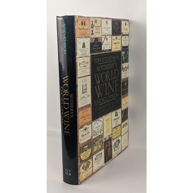 A beautifully illustrated vintage edition of Sotheby's World Wine Encyclopedia by Tom Stevenson, published in 1988 by New...
