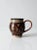 This is a vintage studio pottery mug. The hand-crafted mug has a great large bulbed size with exaggerated handle. It has a...