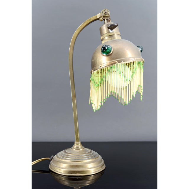 Art Nouveau Brass Table Lamp with Glass Cabochons, Circa 1910 Add a touch of elegance to your home with this stunning Art...