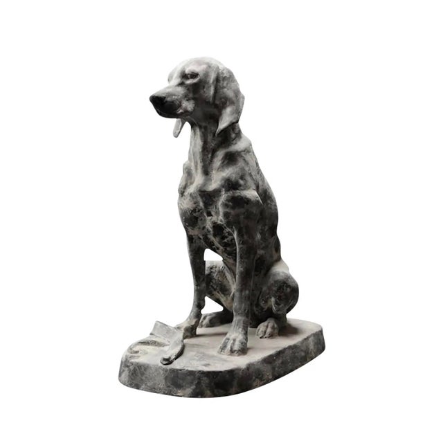 This impressive life-size statue depicts a noble hound in a classic seated pose. Cast in solid iron, the piece features a...