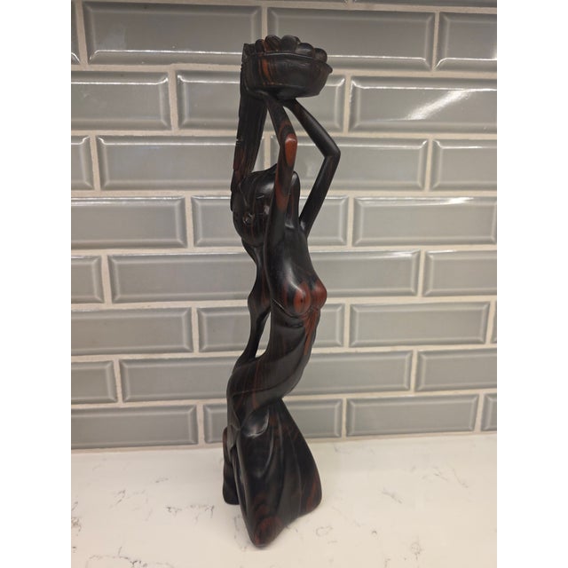 An absolutely exquisite, museum-grade example of mid-century Balinese modernism, this striking 14¼-inch sculpture depicts...