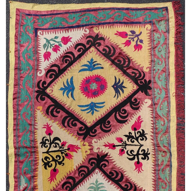 Measures: 4'7 x 7'6 Antique Uzbekistan Suzani Textile with Colorful Geometric Medallion Design. Keivan Woven Arts / rug/...