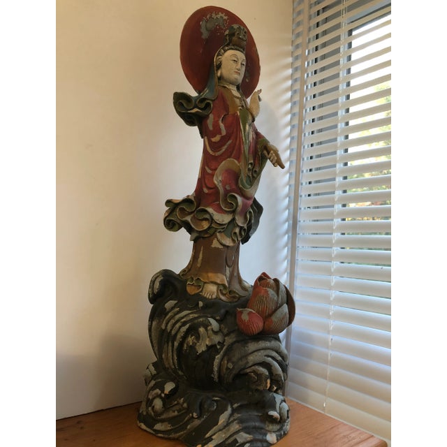 Chinese Carved Wood Standing Figure of Guanyin. A nice Colorful Chinese carved wood standing figure of Guanyin ,with...