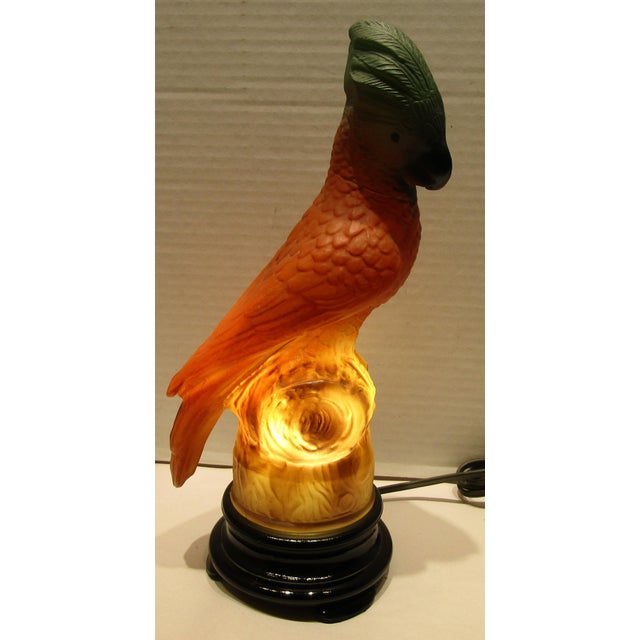 This rare original Tiffin Art Deco glass parrot lamp from the 1930s is a unique and stylish addition to any home decor....