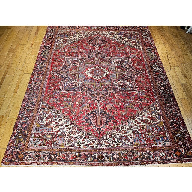"This exquisite room-size Persian Heriz rug, dating to the third quarter of the 20th century, features a striking...
