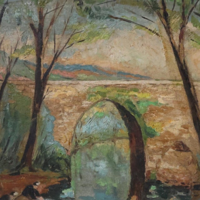 This mid-20th century French forest bridge painting presents a tranquil scene where nature and structure coexist in quiet...