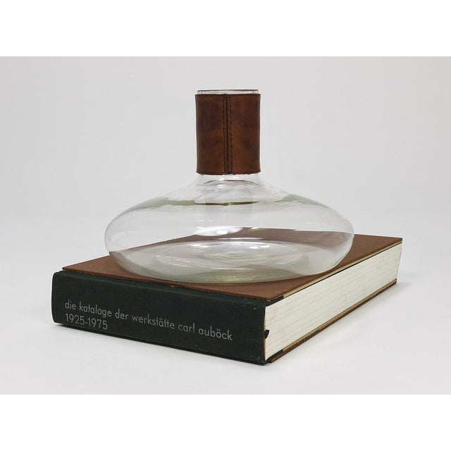A beautiful minimalist Mid-Century Modern vase or decanter, "Tuberkulinkolben" designed and executed by Carl Auböck II in...
